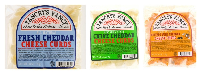 Night Cheese, Part II: Yancey’s Fancy Cheese Curds Wegman’s carries these in three varieties (chive being a recent addition). The Yancey’s website says there are actually five varieties so I guess Wegman’s is holding out on us or something. They are only $3ish a bag, require no cutting utensils, and last for many days. All in all, the plain ones (AND ONLY THE PLAIN ONES) are a very good and worthy cheese investment. I buy them weekly. Regular: Delicious. Salty, chewy and smooth. Only once have they had the authentic squeakiness of a “fresh” cheese curd but news flash they are not fresh they came to Massachusetts from New York and also, who gives a shit? Chive: Do you eat delicious cheese and think “This cheese is great, and all, but I really wish it tasted like it was stored open in the fridge right next to an onion”? Well, HAVE I GOT A CHEESE FOR YOU! Buffalo: Inedible. Seriously too hot. Raging flaming hellfire, and not in a way that is at all pleasant or palatable. My wife is a huge fan of Yancey’s regular Buffalo cheese, and so I bought these for her. I pulled them off the shelf and tossed them in the cart thinking “Damn, I am an all-around terrific, thoughtful wife.” Three curds in, she was done. She loves things far spicer than I can even pretend to tolerate, so of course the next logical step would be for me to try one. I can’t truly recognize a bad decision until I’m fully immersed in it. The Ez Factor: Regular: Ezra loves the regular curds. It is possible that he could love them more than string cheese, if he were capable of evaluating two things comparatively (he is not, he is a cat). Chive: Ezra does not care for the chive curds. His allotment went fully uneaten. Buffalo: We do our best to not harm animals in the creation of this blog, so Ezra was not permitted to sample the Buffalo curds.