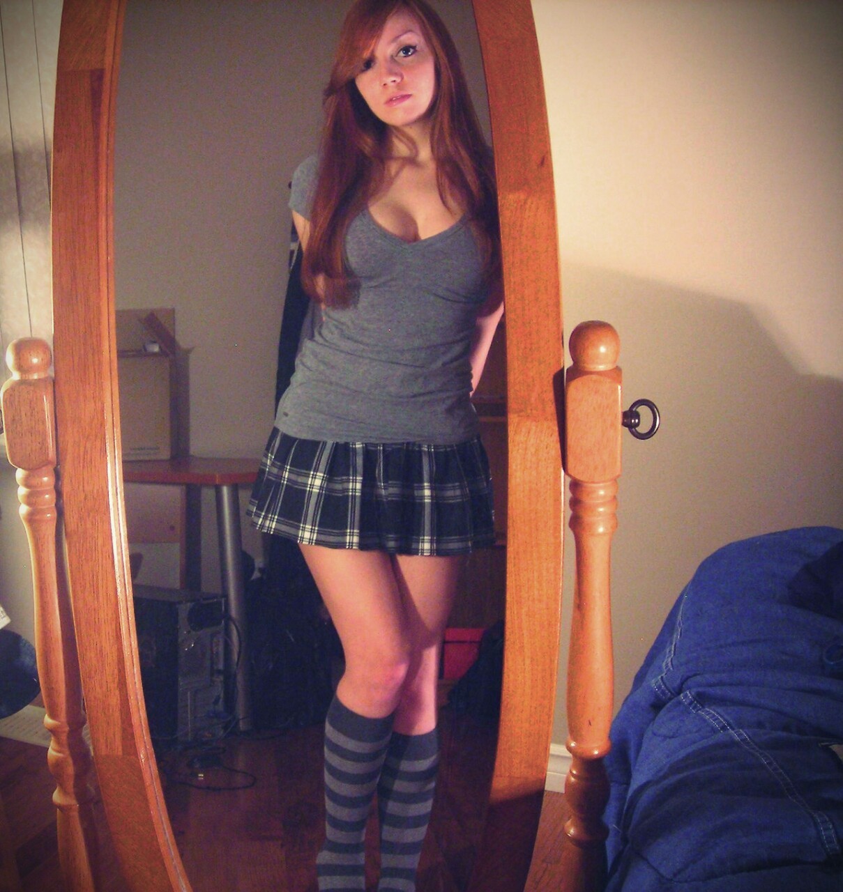 Hot sexy busty girl in mini skirt